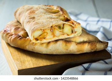 Scaccia Ragusana Potatore And Onion Sicilian Food