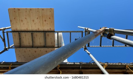 Scaffold In Construction Site - Repair Roof Because Storm Damage In Japan