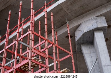 Scaffolding At The Beginning On The Construction Site. Assembled Construction Technology For Tall Buildings Reinforce Concrete To Build Skyscrapers. Abstract Building Architecture Concept.