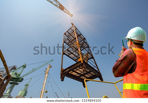 scaffolding lifting by the gantry crane by\
order of the stevedore or engineering, loading master, working on\
high level platform at risk of handle, handling good or equipments\
in high dangerous