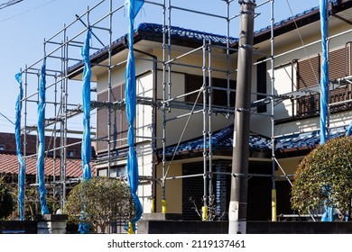Scaffolding for painting the exterior walls of houses