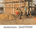 Scaffolding platform for brickwork inside a column and .beam frame providing a safe and stable working surface at required heights for masons. It is made of steel and timber material