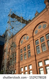 Scaffolding Rises Over The Stained Glass Windows Of Crouse College, Which Is A Building On The Syracuse University Campus In Upstate New York.