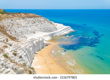 Scala dei Turchi (Italy) - The very famous white rocky cliff on the coast in the municipality of Porto Empedocle, province of Agrigento, Sicily, with beatiful golden beach and blue sea. - Shutterstock ID 2156797801
