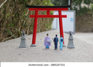 A Scale Of Figure Kannushi Men With Torii Gate