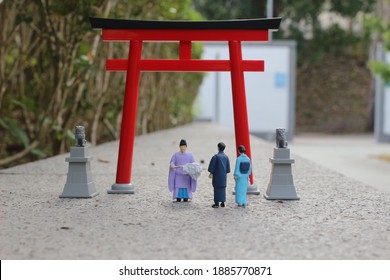 A Scale Of Figure Kannushi Men With Torii Gate