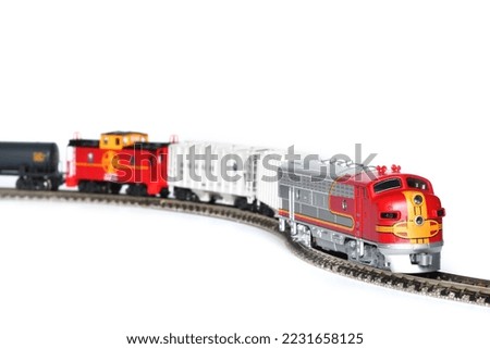 Scale model of a freight train isolated on white background
