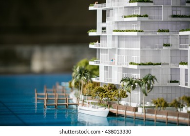 Scale Model Luxury Building On River
