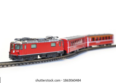 Scale Model Of Red Train Isolated On White