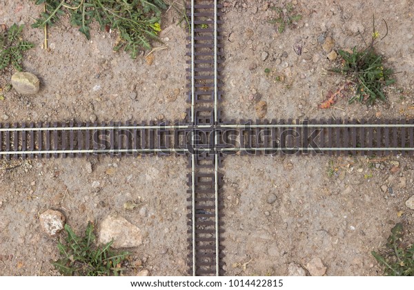 Scale\
railroad crossing view from above, two\
tracks