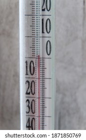 The scale of the thermometer with red columns. Outdoor device for measuring air temperature - Shutterstock ID 1871850769
