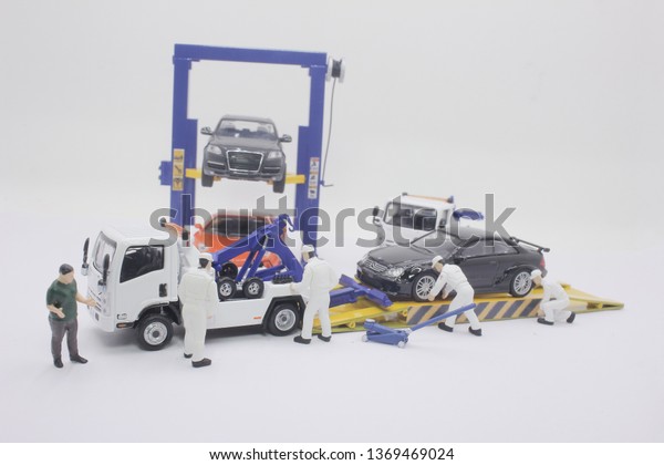 a scale Tow Truck\
and Driver Services 