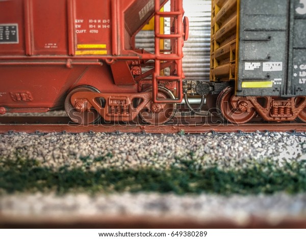 Scale train cars on a scale\
model