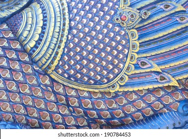 Scales of the dragon statue. Stucco surface of the animal