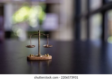 The Scales Of Injustice, The Hammer Of The Law Tiger Skin Judges On The Table In The Conceptual Law Office.