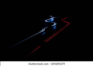 Scalextric Car Around Track In The Dark