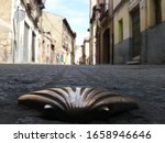 The scallop shell, often found on the shores in Galicia, has long been the symbol of the Camino de Santiago.
