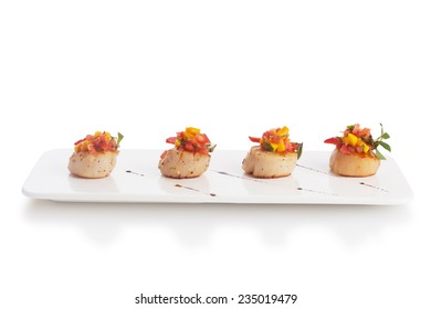 Scallop Soaked With Fresh Yellow Mango Salsa, Isolated On White.