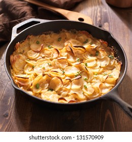 Scalloped Potatoes In Rustic Iron Skillet