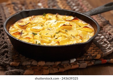 Scalloped Potatoes In A Rustic Iron Skillet