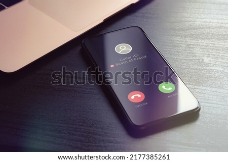 Scam fishing phone call from unknown number that was identified by a security anti-scam phone calls app as alert and fraudulent. Block Scam and unwanted calls concept