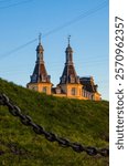 Scandinavian architecture in beautiful city of Copenhagen under afternoon sun golden hour. Tourism in Denmark and nordic capital cities. 150 years old antique building, low viewpoint from The Lakes.