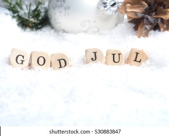 Scandinavian Merry Christmas with the words God Jul in snow