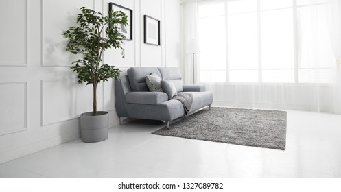 Scandinavian style livingroom with fabric sofa, sofa table. morning image with plant. sofa table on the lug.