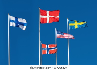 Scandinavian and The United States Flag on blue sky background