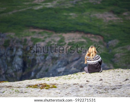 Similar – Image, Stock Photo Enjoy the view. Woman with headband, jacket. Ireland