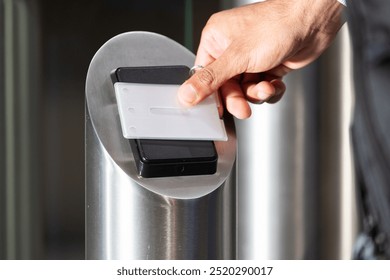 Scanning access card, person entering secure office building for work. Security, identification, workplace, technology, corporate, entry - Powered by Shutterstock