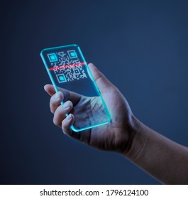 Scanning QR code with mobile smart phone. Isolated on white background.
Qr code payment, E wallet , cashless technology concept.