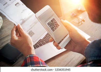 Scanning Two-Dimensional Code with Mobile Phone             - Shutterstock ID 1334351945
