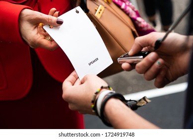 Scanning visitor pass to enter an event or conference - Shutterstock ID 1724919748