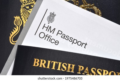 Scarborough, UK - November 1st, 2020: Close up of UK Passport Office logo or letterhead against new british passport 2020