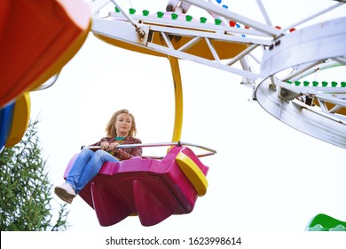 Scared Or Boring Woman Riding On Rollercoaster