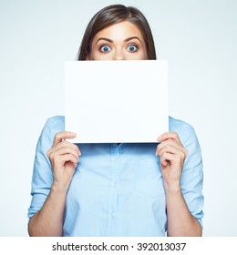Scared business woman hide face with white sign board. Isolated portrait.
