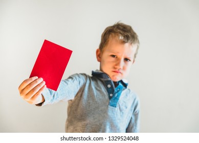 Scared Child With Red Anti Bullying Card