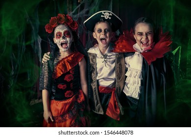 Scared Children Celebrate Halloween On A Party With Old Castle Decorations. Halloween.