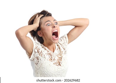 Scared crazy woman crying with hands on head isolated on a white background 