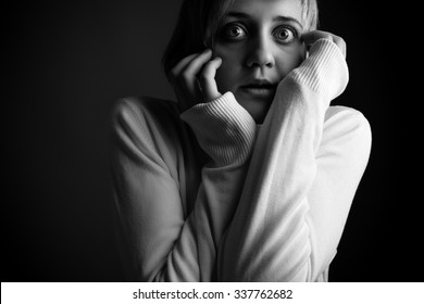 Scared girl. Black and White. Low key - Shutterstock ID 337762682