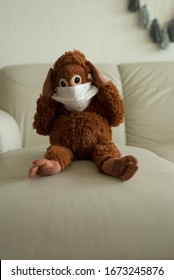 Scared Holding Head Plush Monkey In The Mask