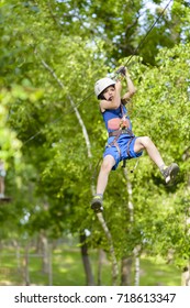 Scared Kid On Zip Line Summer Day