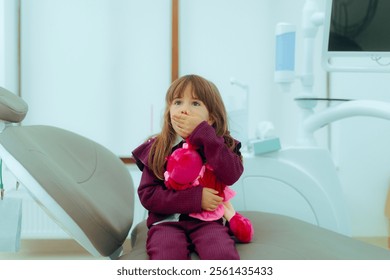 
Scared Little Patient Having Painful Cavity in Dental Cabinet. Little girl being anxious about a dentist appointment 
 - Powered by Shutterstock