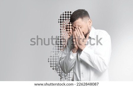 Scared man having hallucination on light background. Distorted image