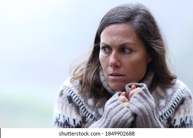 Scared Middle Aged Woman Standing In A Forest A Foggy Day Of Winter