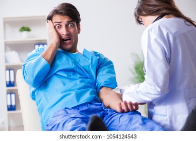 Scared Patient Man Getting Ready For Flu Shot