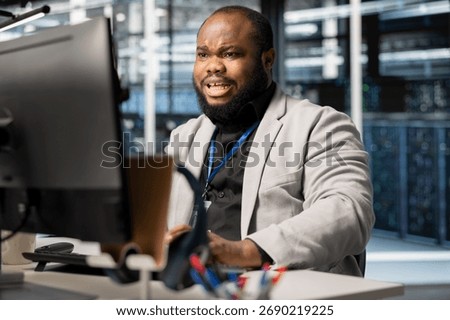 Scared programmer in server room panicked by diagnostic report showing critical hardware malfunction on PC. Afraid African american worker disturbed by error notifications risking system uptime