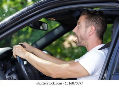 Scared And Shocked Male Driver