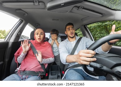 Scared Shocked Muslim Husband, Wife In Hijab And Child With Closed Eyes In Car Cabin During Incident, Free Space. Traffic Accident, Facial Expression And Problems On Road, Crash And Life Insurance